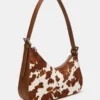 Bolso Smith con estampado de vaca marrón Bolso Smith con estampado de vaca marrón