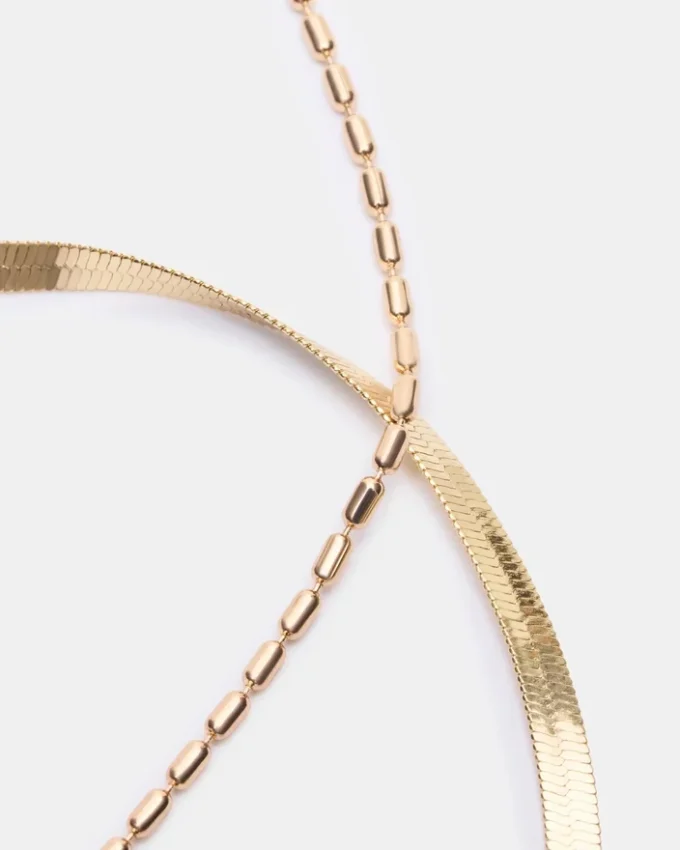 Conjunto de tobilleras con cadena en espiga dorada Conjunto de tobilleras con cadena en espiga dorada