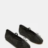 Delara Negro con múltiples pedrería Delara Negro con múltiples pedrería