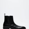 Haynes de cuero negro Haynes de cuero negro