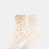 Pack de 2 calcetines de tul con estampado de flores silvestres en color rosa palo Pack de 2 calcetines de tul con estampado de flores silvestres en color rosa palo
