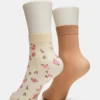Pack de 2 pares de calcetines tobilleros transparentes con estampado floral, color vainilla