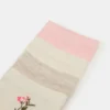 Pack de 4 calcetines con flores en tonos marfil Pack de 4 calcetines con flores en tonos marfil