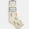 Pack de 4 calcetines con flores en tonos marfil Pack de 4 calcetines con flores en tonos marfil