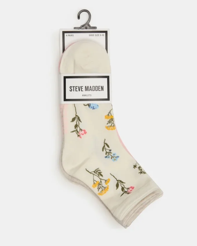 Pack de 4 calcetines con flores en tonos marfil Pack de 4 calcetines con flores en tonos marfil