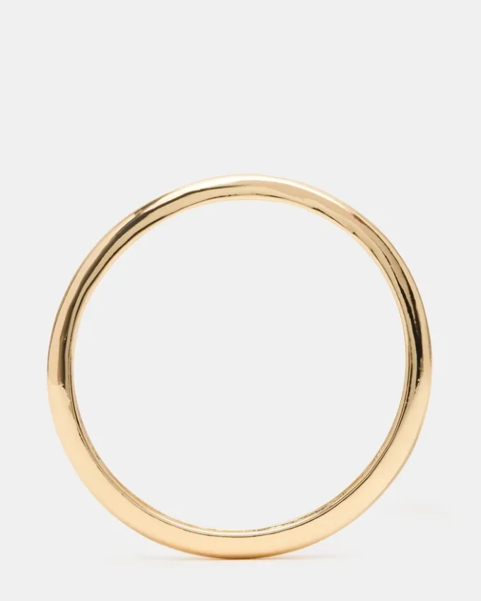 Pulsera tipo brazalete fino dorada