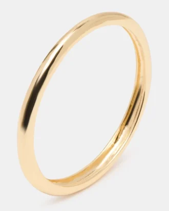 Pulsera tipo brazalete fino dorada