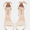 Zapatos de malla blancos Carrson para niños